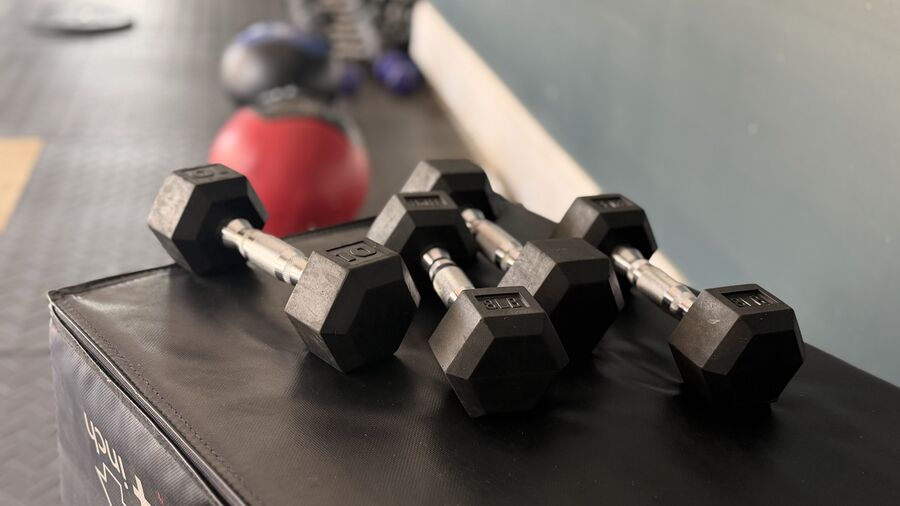 Dumbbells arranged on a plyo box
