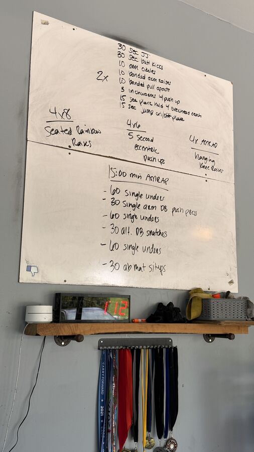 Today's workout written on the WOD board